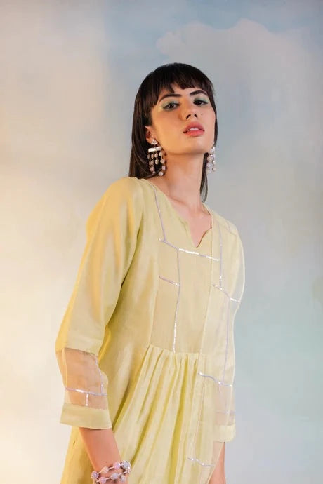 Yellow Cotton Kurta Set With Dupatta by Charkhee with Aasma by Charkhee, Aasmaa by Charkhee, Chanderi, Cotton, Embellished, Indian Wear, Kurta Pant Sets, Kurta Set With Dupatta, Natural, Relaxed Fit, Sequin work, Wedding Wear, Womenswear, Yellow at Kamakhyaa for sustainable fashion