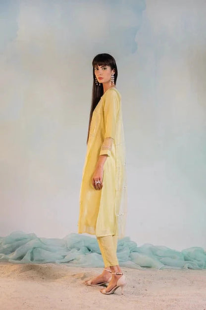 Yellow Cotton Kurta Set With Dupatta by Charkhee with Aasma by Charkhee, Aasmaa by Charkhee, Chanderi, Cotton, Embellished, Indian Wear, Kurta Pant Sets, Kurta Set With Dupatta, Natural, Relaxed Fit, Sequin work, Wedding Wear, Womenswear, Yellow at Kamakhyaa for sustainable fashion