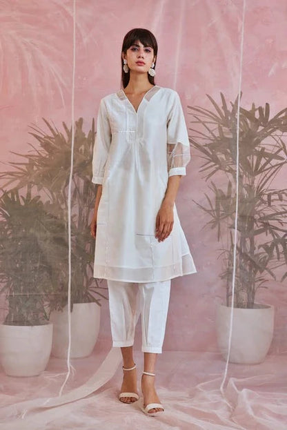 White Cotton Kurta Set With Organza Dupatta by Charkhee with Aasma by Charkhee, Aasmaa by Charkhee, Chanderi, Cotton, Embellished, Indian Wear, Kurta Pant Sets, Kurta Set With Dupatta, Natural, Organza, Relaxed Fit, Sequin work, Wedding Wear, White, Womenswear at Kamakhyaa for sustainable fashion