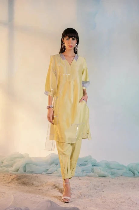 Yellow Cotton Kurta Set With Organza Dupatta by Charkhee with Aasma by Charkhee, Aasmaa by Charkhee, Chanderi, Cotton, Embellished, Indian Wear, Kurta Pant Sets, Kurta Set With Dupatta, Natural, Organza, Relaxed Fit, Sequin work, Wedding Wear, Womenswear, Yellow at Kamakhyaa for sustainable fashion