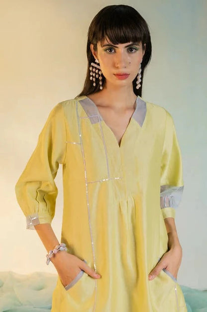 Yellow Cotton Kurta Set With Organza Dupatta by Charkhee with Aasma by Charkhee, Aasmaa by Charkhee, Chanderi, Cotton, Embellished, Indian Wear, Kurta Pant Sets, Kurta Set With Dupatta, Natural, Organza, Relaxed Fit, Sequin work, Wedding Wear, Womenswear, Yellow at Kamakhyaa for sustainable fashion