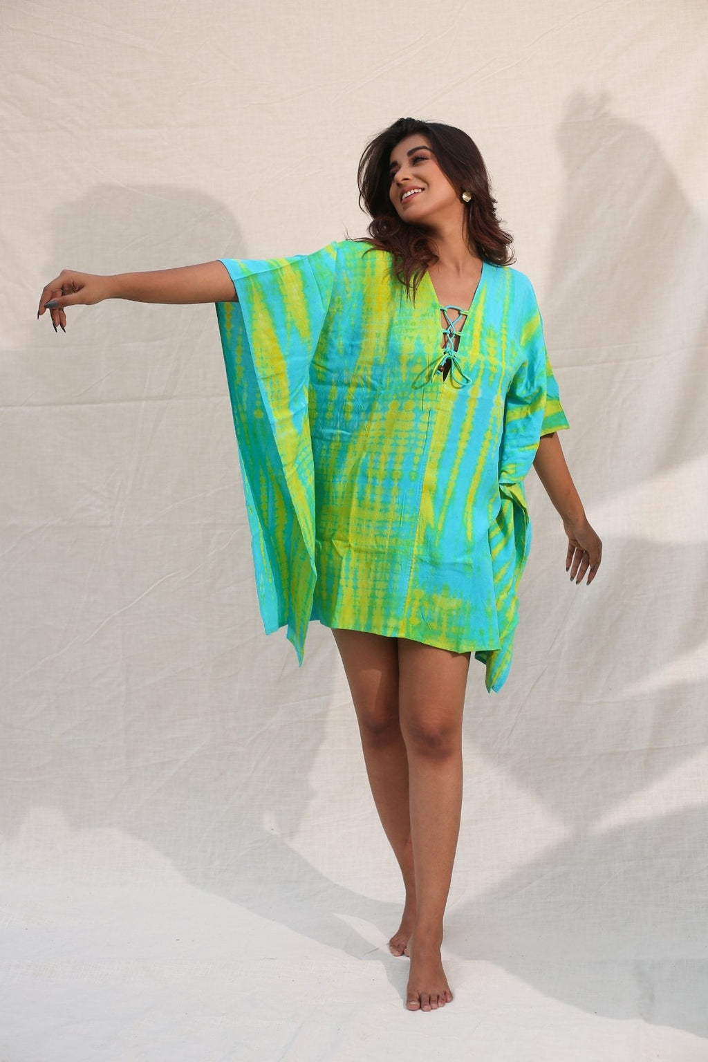 Turquoise And Lime Green Kaftan by Keva with Blue, Day Dream, Green, Kaftan Dresses, Kaftans, Mini Dresses, Natural, Rayon, Relaxed Fit, Resort Wear, Tie & Dye, Tops, Womenswear at Kamakhyaa for sustainable fashion