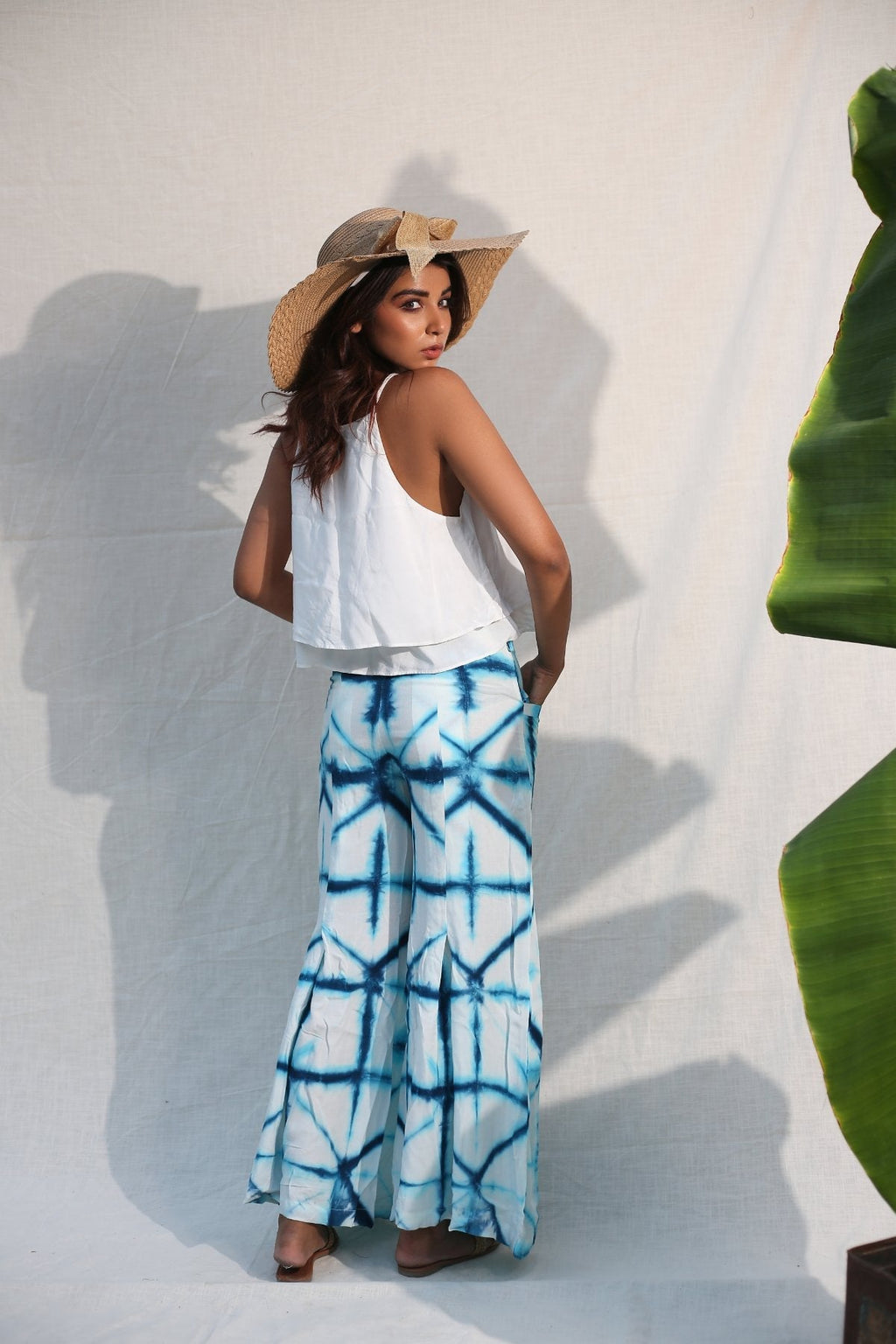Blue And White Bell Bottom Pants by Keva with Blue, Day Dream, Natural, Palazzo Pants, Rayon, Relaxed Fit, Resort Wear, Tie & Dye, Womenswear at Kamakhyaa for sustainable fashion