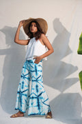Blue And White Bell Bottom Pants by Keva with Blue, Day Dream, Natural, Palazzo Pants, Rayon, Relaxed Fit, Resort Wear, Tie & Dye, Womenswear at Kamakhyaa for sustainable fashion