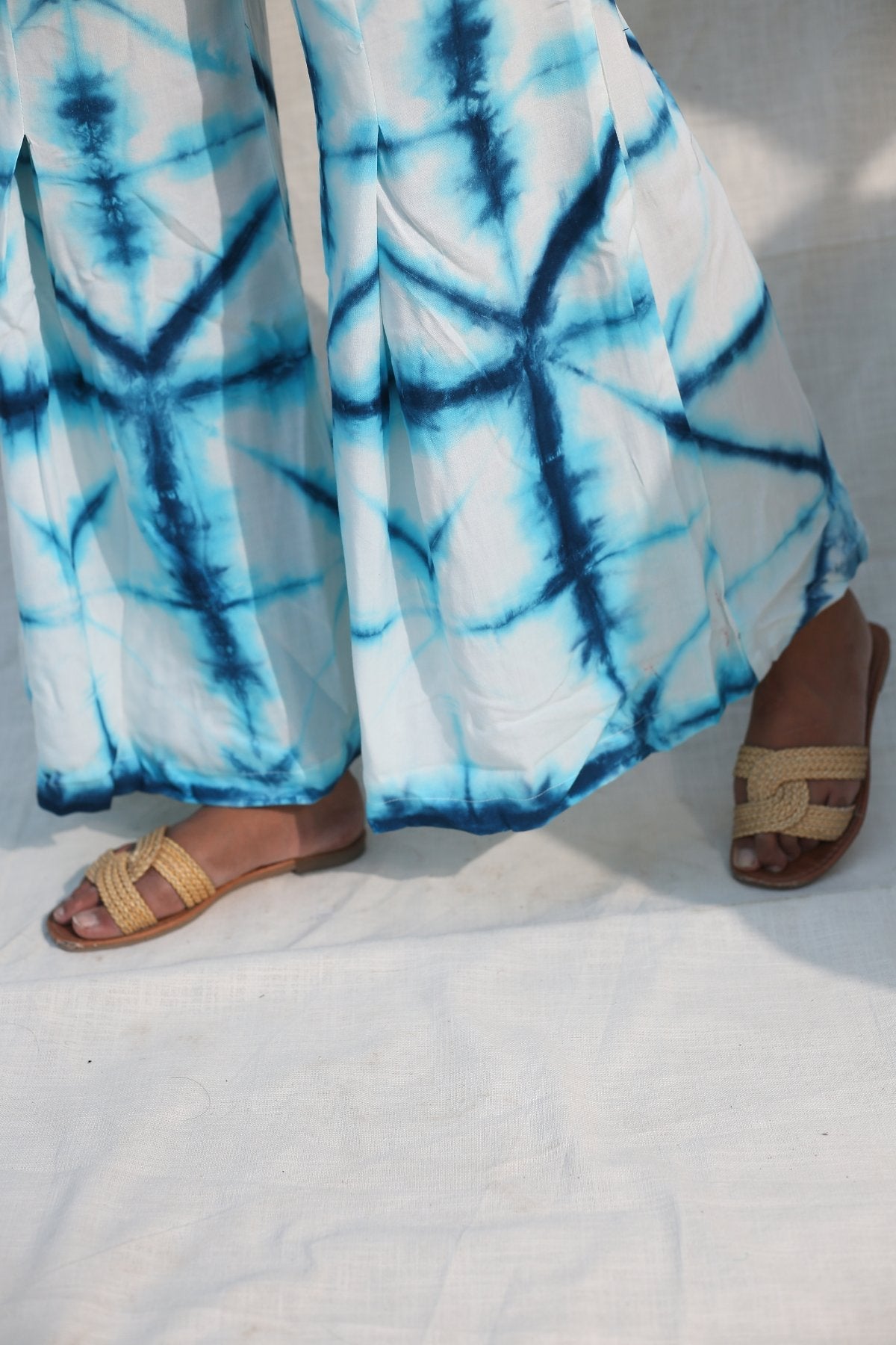 Blue And White Bell Bottom Pants by Keva with Blue, Day Dream, Natural, Palazzo Pants, Rayon, Relaxed Fit, Resort Wear, Tie & Dye, Womenswear at Kamakhyaa for sustainable fashion