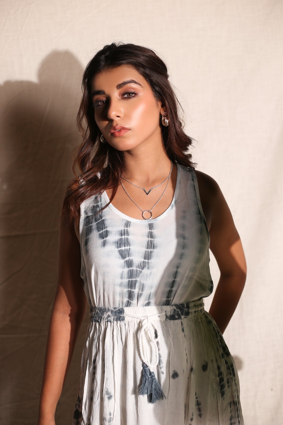 White Skirt And Top- Set of Two by Keva with Best Selling, Co-ord Sets, Crepe, Day Dream, Lounge Wear Co-ords, Natural, Rayon, Relaxed Fit, Resort Wear, Skirt Sets, Tie & Dye, Vacation Co-ords, White, Womenswear at Kamakhyaa for sustainable fashion