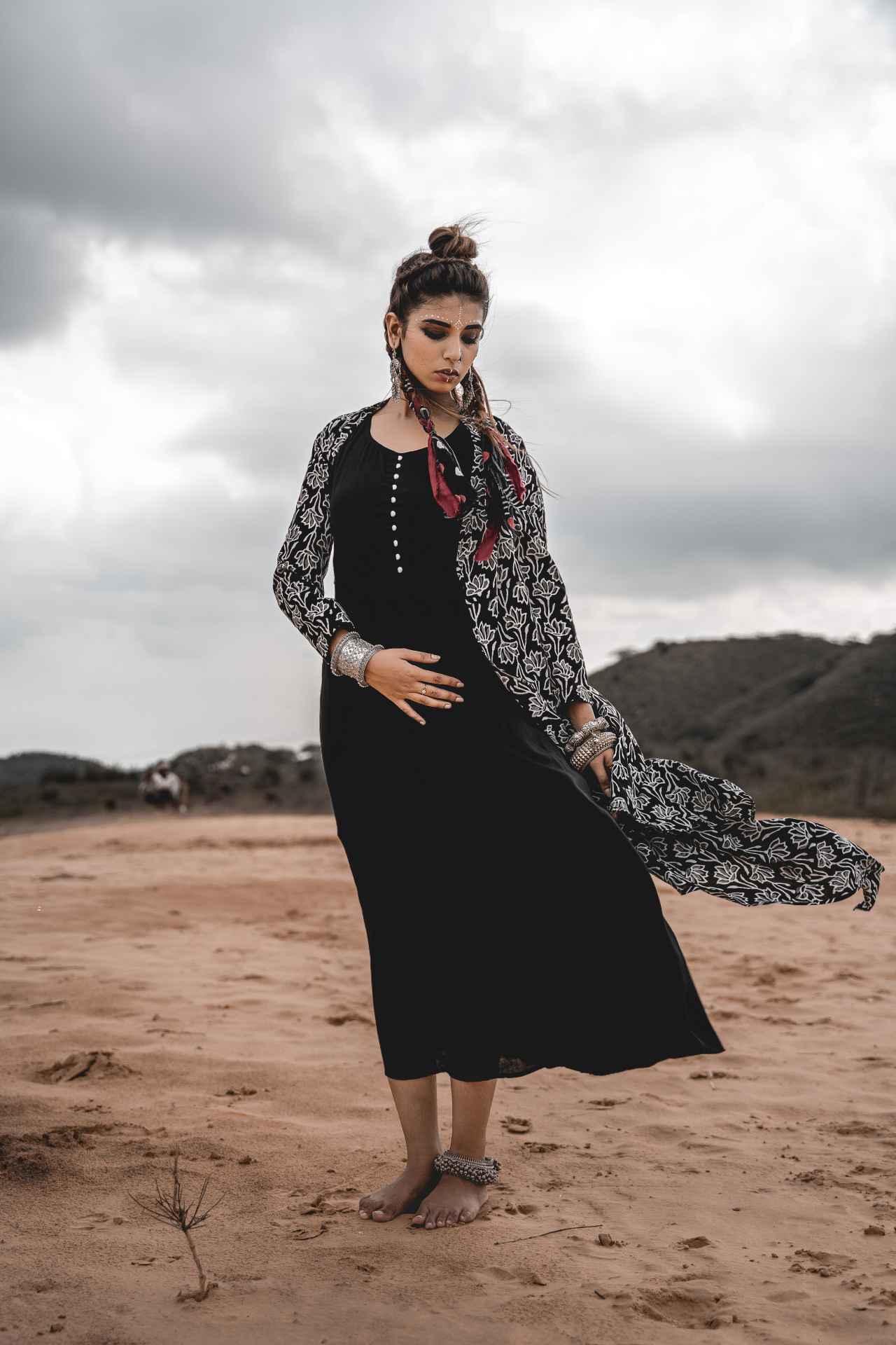 Black Rayon Dress With Cotton Block Printed Asymmetric Cape - Set Of 2 by Keva with Black, Block Prints, Cape, Co-ord Sets, Cotton, Dress Sets, For Mother, For Mother W, Jackets, Midi Dresses, Natural, Relaxed Fit, Resort Wear, Wild Child, Womenswear at Kamakhyaa for sustainable fashion