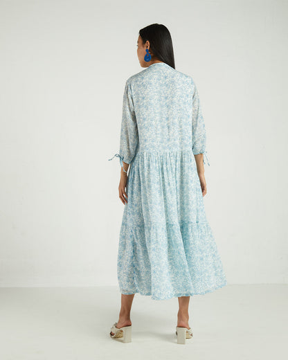 Blue Floral Midi Dress by Reistor with A Summer Situation by Reistor, Bemberg, Blue, Casual Wear, FB ADS JUNE, Midi Dresses, Natural, Printed Selfsame, Prints, Regular Fit, Tiered Dresses, Womenswear at Kamakhyaa for sustainable fashion