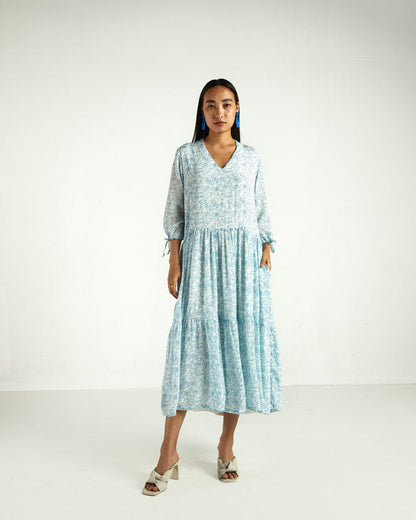 Blue Floral Midi Dress by Reistor with A Summer Situation by Reistor, Bemberg, Blue, Casual Wear, FB ADS JUNE, Midi Dresses, Natural, Printed Selfsame, Prints, Regular Fit, Tiered Dresses, Womenswear at Kamakhyaa for sustainable fashion