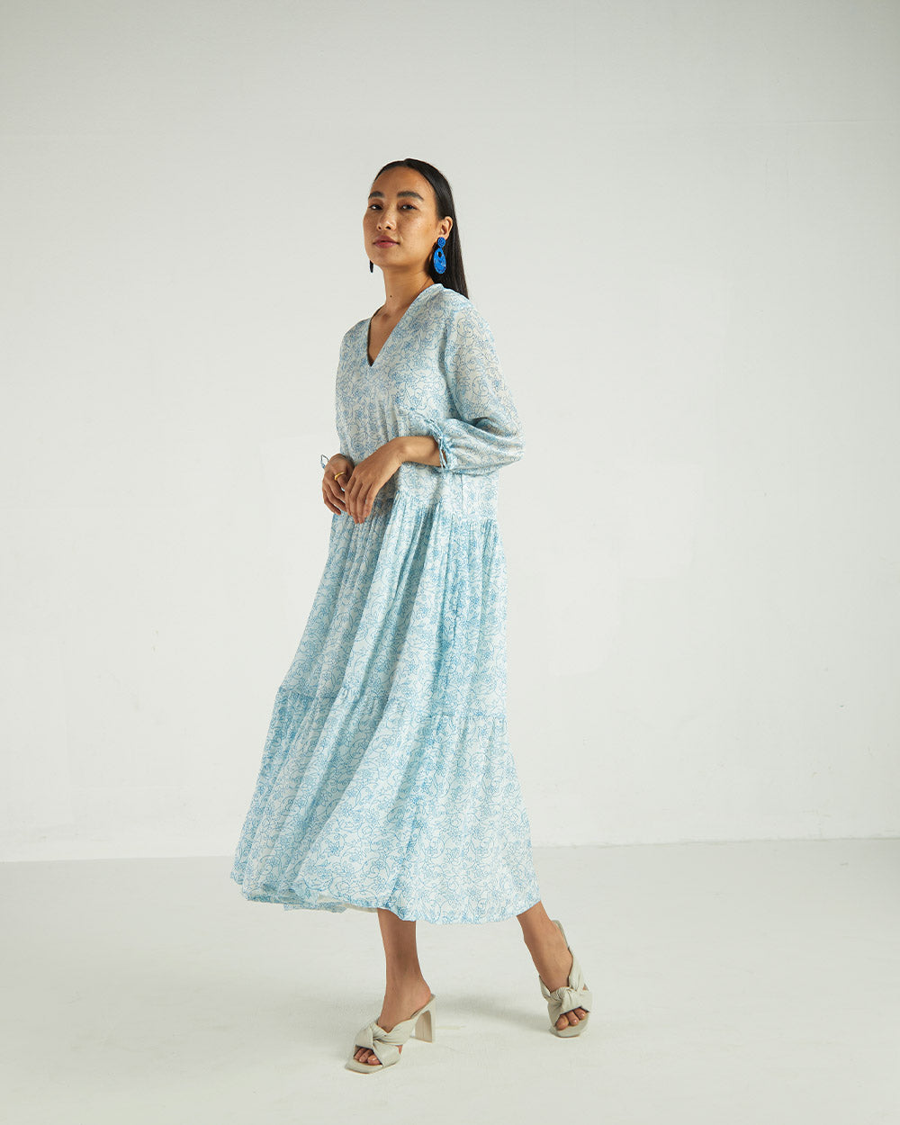 Blue Floral Midi Dress by Reistor with A Summer Situation by Reistor, Bemberg, Blue, Casual Wear, FB ADS JUNE, Midi Dresses, Natural, Printed Selfsame, Prints, Regular Fit, Tiered Dresses, Womenswear at Kamakhyaa for sustainable fashion