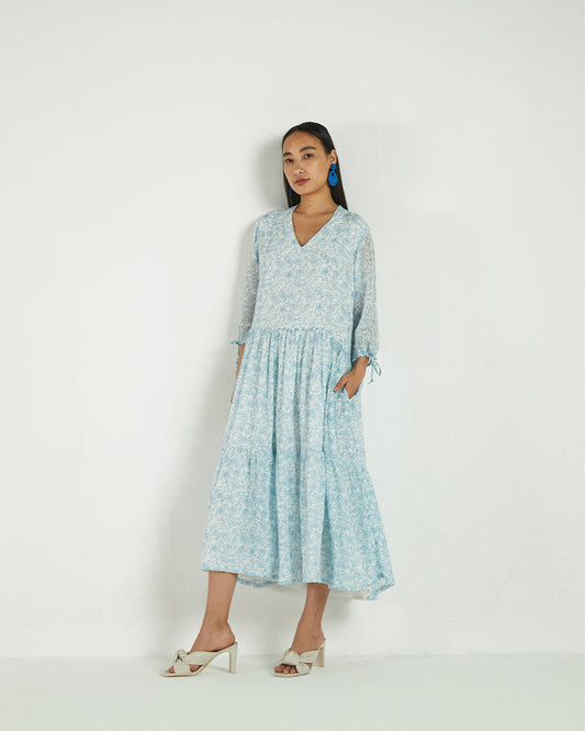 Blue Floral Midi Dress by Reistor with A Summer Situation by Reistor, Bemberg, Blue, Casual Wear, FB ADS JUNE, Midi Dresses, Natural, Printed Selfsame, Prints, Regular Fit, Tiered Dresses, Womenswear at Kamakhyaa for sustainable fashion