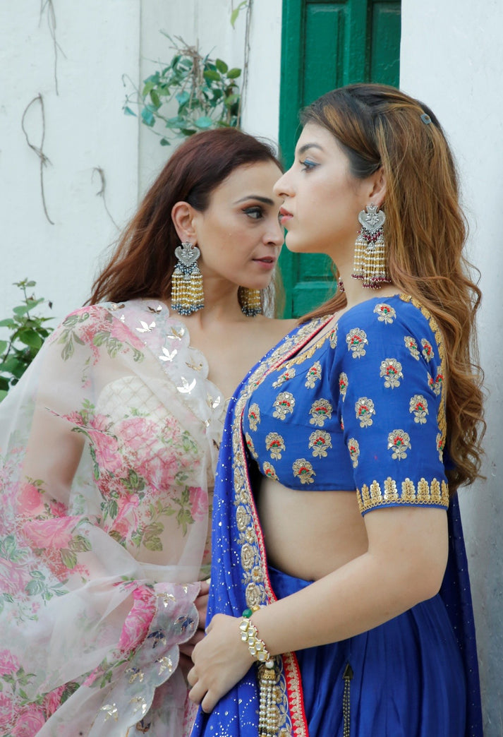 Wedding guest look white saree blue blouse and jhumka earring  Wedding  guest looks Wedding colors Marriage day