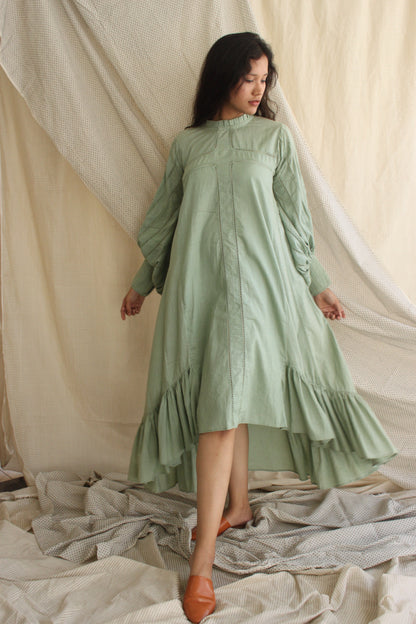 Green Ruffled Full Sleeves Dress by Chambray & Co. with Casual Wear, Cotton, Green, Midi Dresses, Natural, Regular Fit, Ruffle Dresses, Solid Selfmade, Solids, Tiered Dresses, Womenswear at Kamakhyaa for sustainable fashion