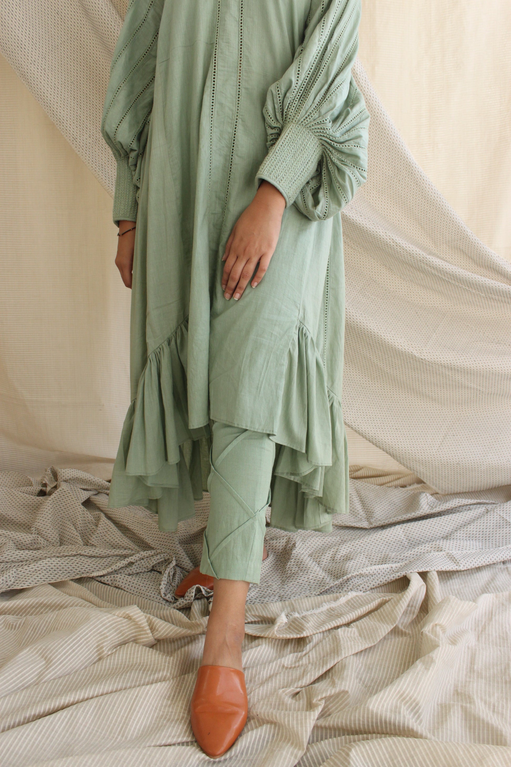 Green Ruffled Full Sleeves Dress by Chambray & Co. with Casual Wear, Cotton, Green, Midi Dresses, Natural, Regular Fit, Ruffle Dresses, Solid Selfmade, Solids, Tiered Dresses, Womenswear at Kamakhyaa for sustainable fashion