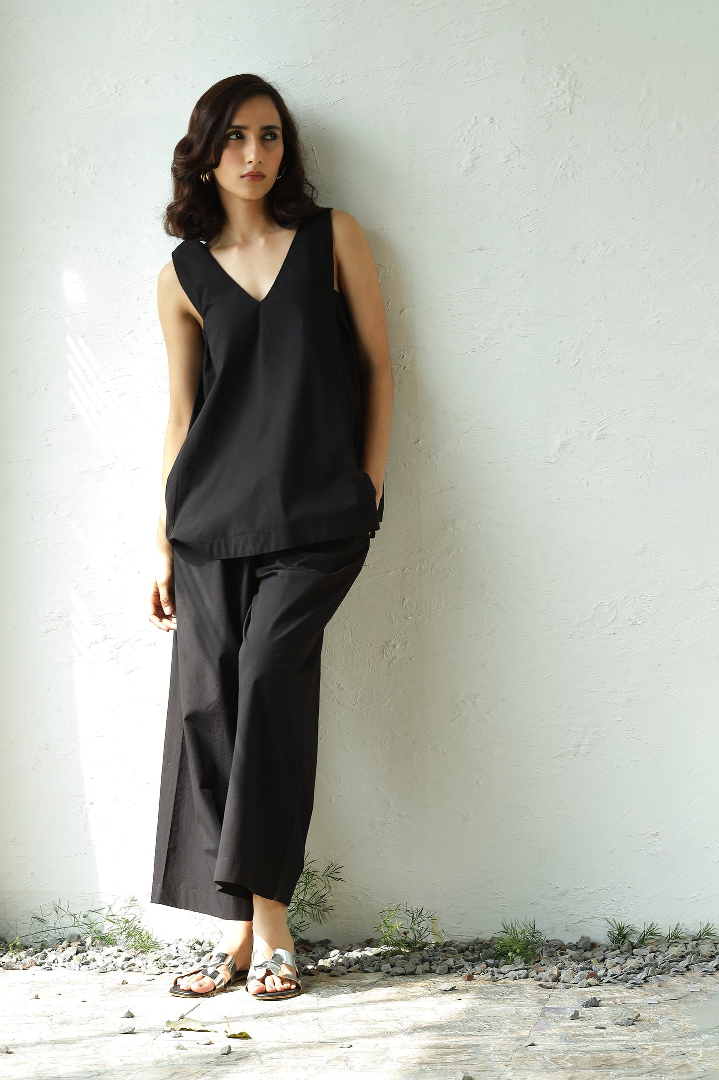 Black Sleeveless V Neck Top With Black Flared Pant Set by Canoopi with Black, Canoopi, Casual Wear, Complete Sets, Natural, Poplin, Regular Fit, Solids, Vacation Co-ords, Womenswear at Kamakhyaa for sustainable fashion