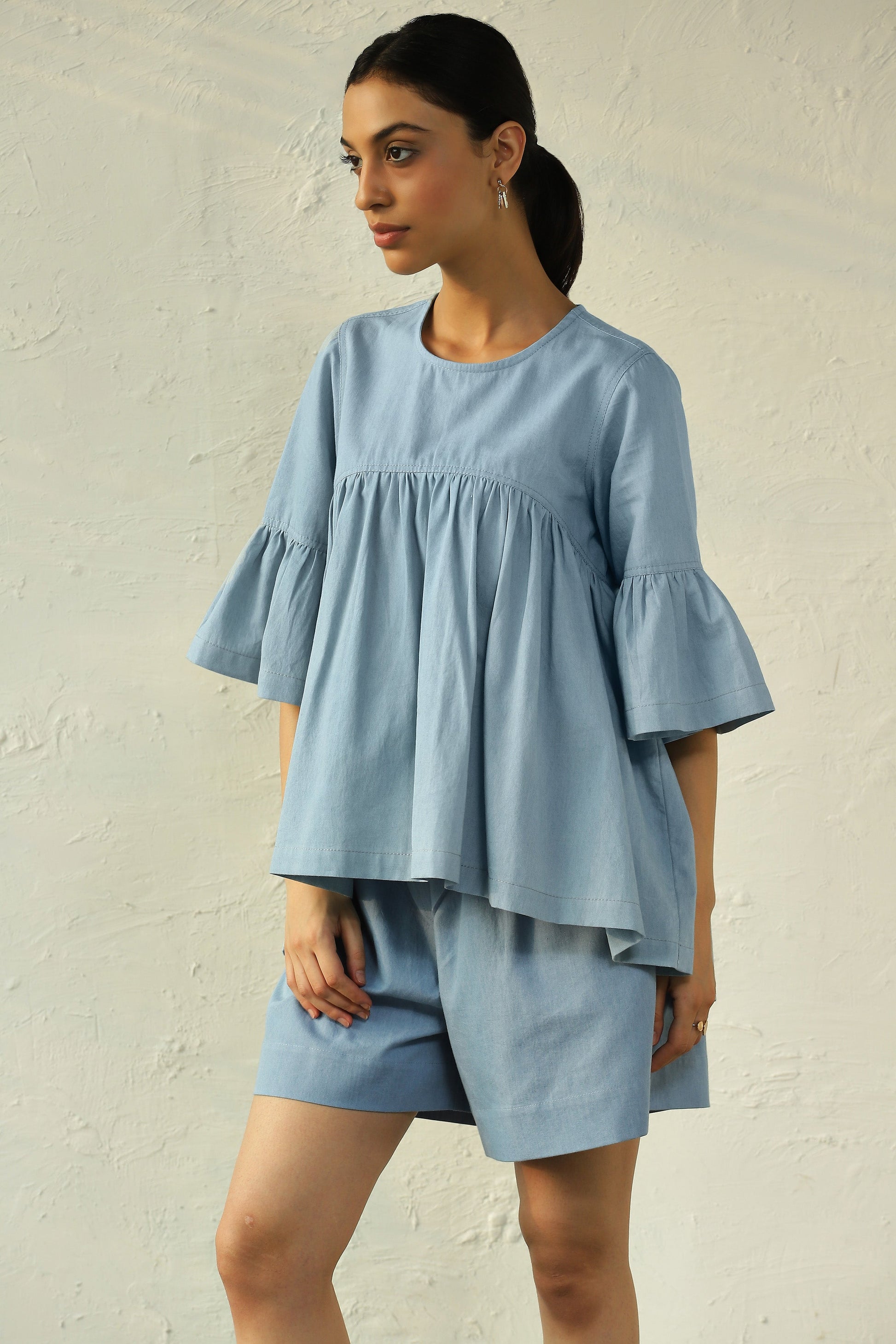 Blue Denim Co-Ord Set With Bell Sleeves by Canoopi with Blue, Canoopi, Casual Wear, Complete Sets, Cotton, Denim, Natural, Regular Fit, Solids, Vacation Co-ords, Womenswear at Kamakhyaa for sustainable fashion