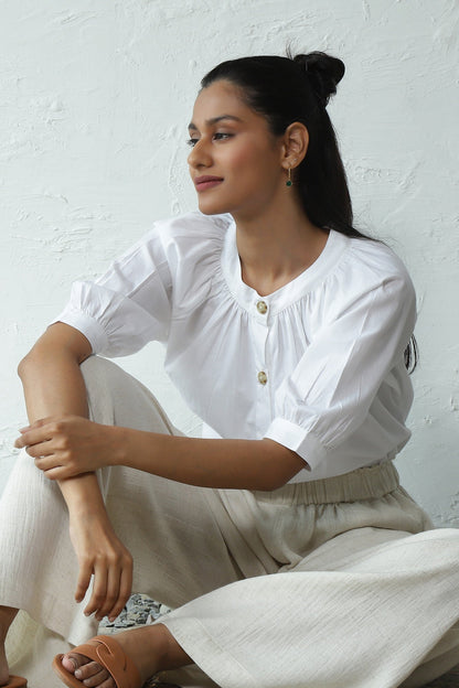 White Gathered Top Pant Cotton Co-Ord Set by Canoopi with Blue, Canoopi, Casual Wear, Complete Sets, Natural, Poplin, Rayon, Regular Fit, Solids, Vacation Co-ords, White, Womenswear at Kamakhyaa for sustainable fashion