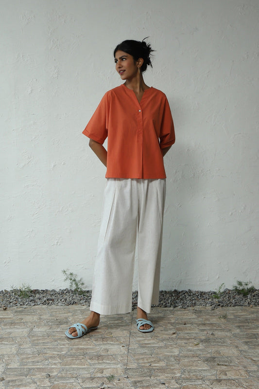Orange Cotton Shirt With White Khadi Pant Set by Canoopi with Canoopi, Casual Wear, Complete Sets, Khadi, Natural, Orange, Poplin, Regular Fit, Solids, Vacation Co-ords, White, Womenswear at Kamakhyaa for sustainable fashion