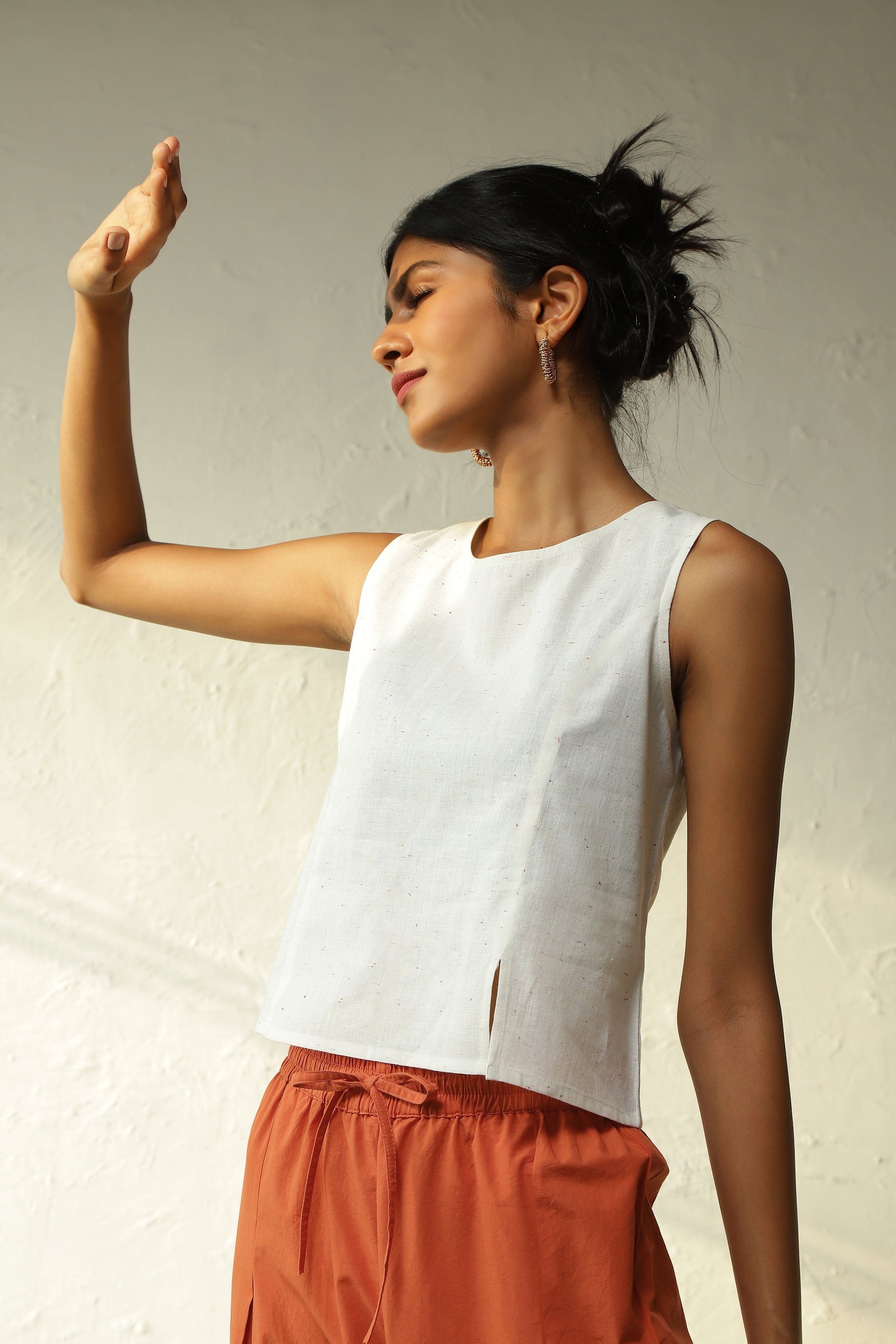 White Cotton Front Slit Top With Orange Palazzo Co-Ord Set by Canoopi with Canoopi, Casual Wear, Complete Sets, Khadi, Natural, Orange, Poplin, Regular Fit, Solids, Vacation Co-ords, White, Womenswear at Kamakhyaa for sustainable fashion