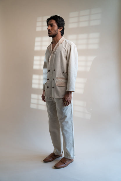 Dawning Unisex Double Breasted Jacket & Pleated Pants Set by Lafaani with Beige, Bottoms, Casual Wear, Co-ord Sets, Dawning by Lafaani, Denim, Embroidered, For Him, Hand Woven Cotton, Kora, Mens Co-ords, Menswear, Natural, Regular Fit, Unisex at Kamakhyaa for sustainable fashion