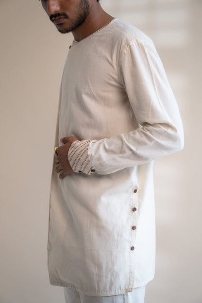 Dawning Angrakha Long Shirt at Kamakhyaa by Lafaani. This item is Beige, Casual Wear, Denim, Embroidered, For Father, For Him, Hand Woven Cotton, Kora, Menswear, Natural, Regular Fit, Shirts, Tops