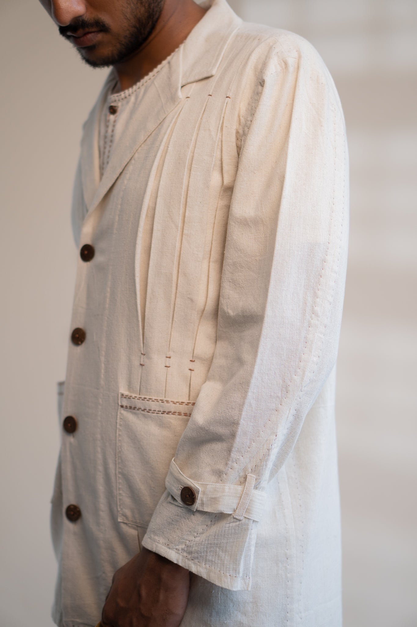 Dawning Unisex Pleated Blazer by Lafaani with Beige, Blazers, Casual Wear, Dawning by Lafaani, Denim, Embroidered, For Him, Hand Woven Cotton, Kora, Mens Overlay, Menswear, Natural, Regular Fit, Unisex at Kamakhyaa for sustainable fashion