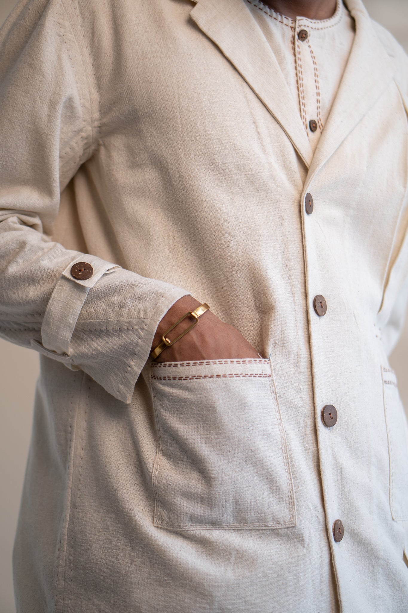 Dawning Unisex Pleated Blazer by Lafaani with Beige, Blazers, Casual Wear, Dawning by Lafaani, Denim, Embroidered, For Him, Hand Woven Cotton, Kora, Mens Overlay, Menswear, Natural, Regular Fit, Unisex at Kamakhyaa for sustainable fashion