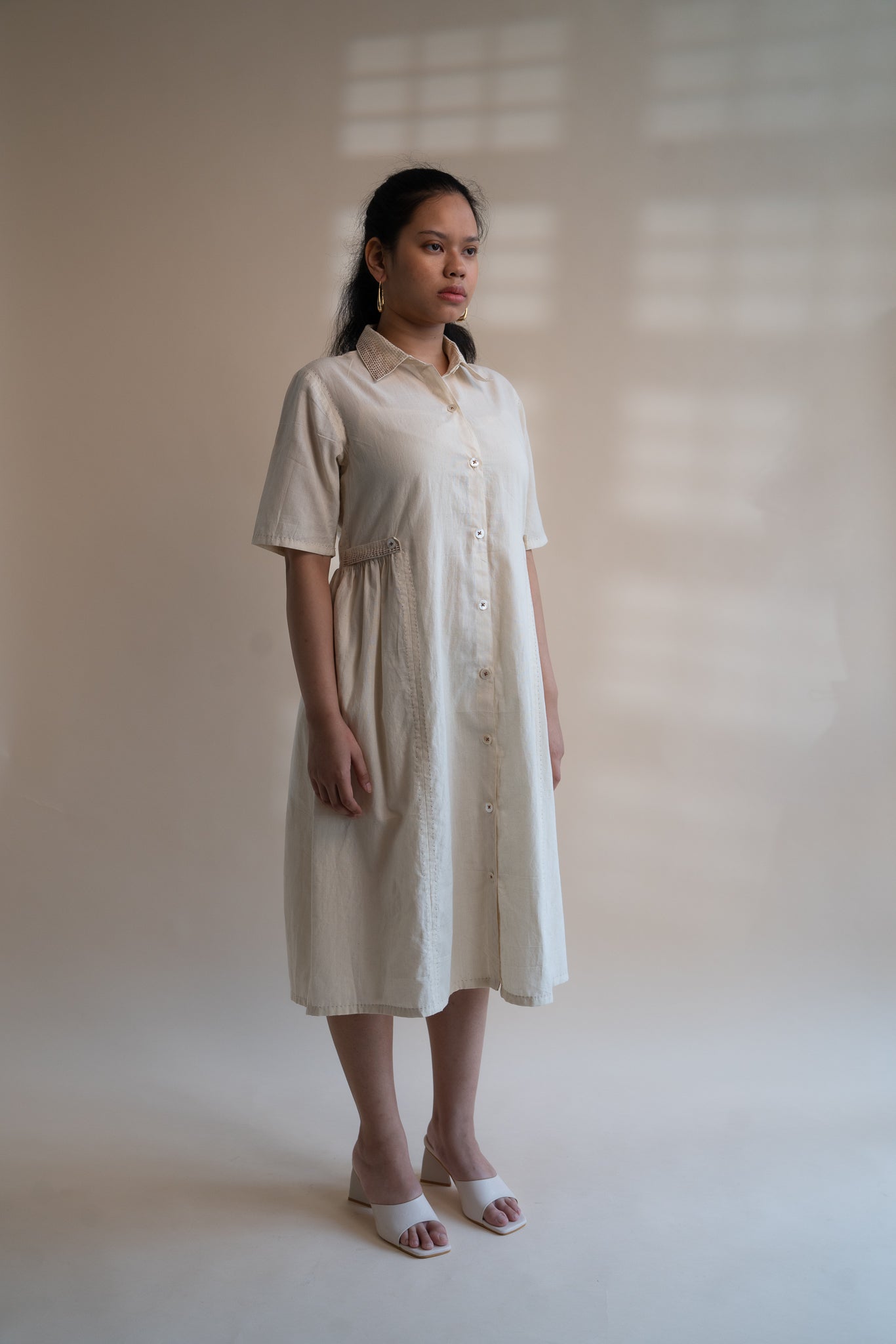 Dawning Button Down Dress at Kamakhyaa by Lafaani. This item is Beige, Casual Wear, Denim, Embroidered, Hand Woven Cotton, Kora, Natural, Regular Fit, Shirt Dresses, Shirts, Womenswear