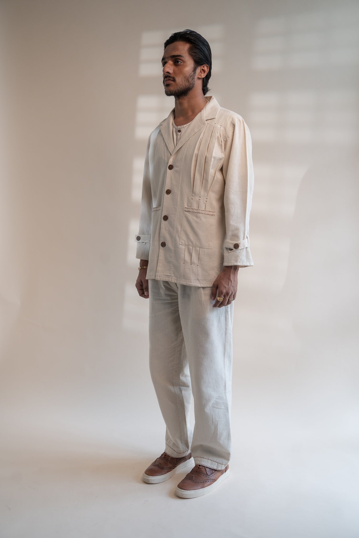 Dawning Unisex Pleated Blazer by Lafaani with Beige, Blazers, Casual Wear, Dawning by Lafaani, Denim, Embroidered, For Him, Hand Woven Cotton, Kora, Mens Overlay, Menswear, Natural, Regular Fit, Unisex at Kamakhyaa for sustainable fashion