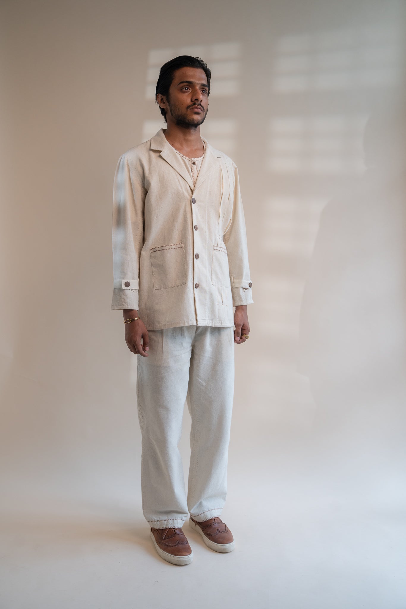 Dawning Unisex Pleated Blazer at Kamakhyaa by Lafaani. This item is Beige, Blazers, Casual Wear, Denim, Embroidered, For Him, Hand Woven Cotton, Kora, Mens Overlay, Menswear, Natural, Regular Fit, Unisex
