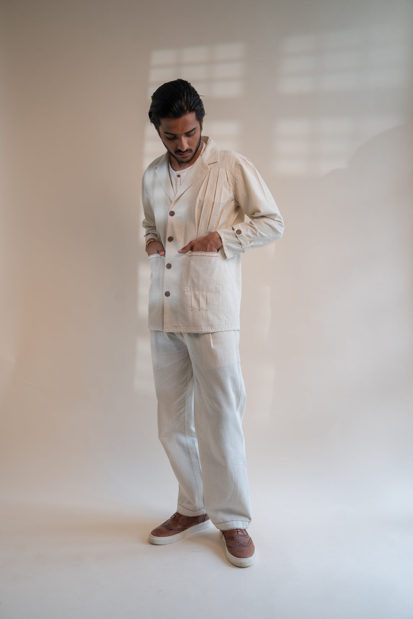 Dawning Unisex Pleated Blazer by Lafaani with Beige, Blazers, Casual Wear, Dawning by Lafaani, Denim, Embroidered, For Him, Hand Woven Cotton, Kora, Mens Overlay, Menswear, Natural, Regular Fit, Unisex at Kamakhyaa for sustainable fashion