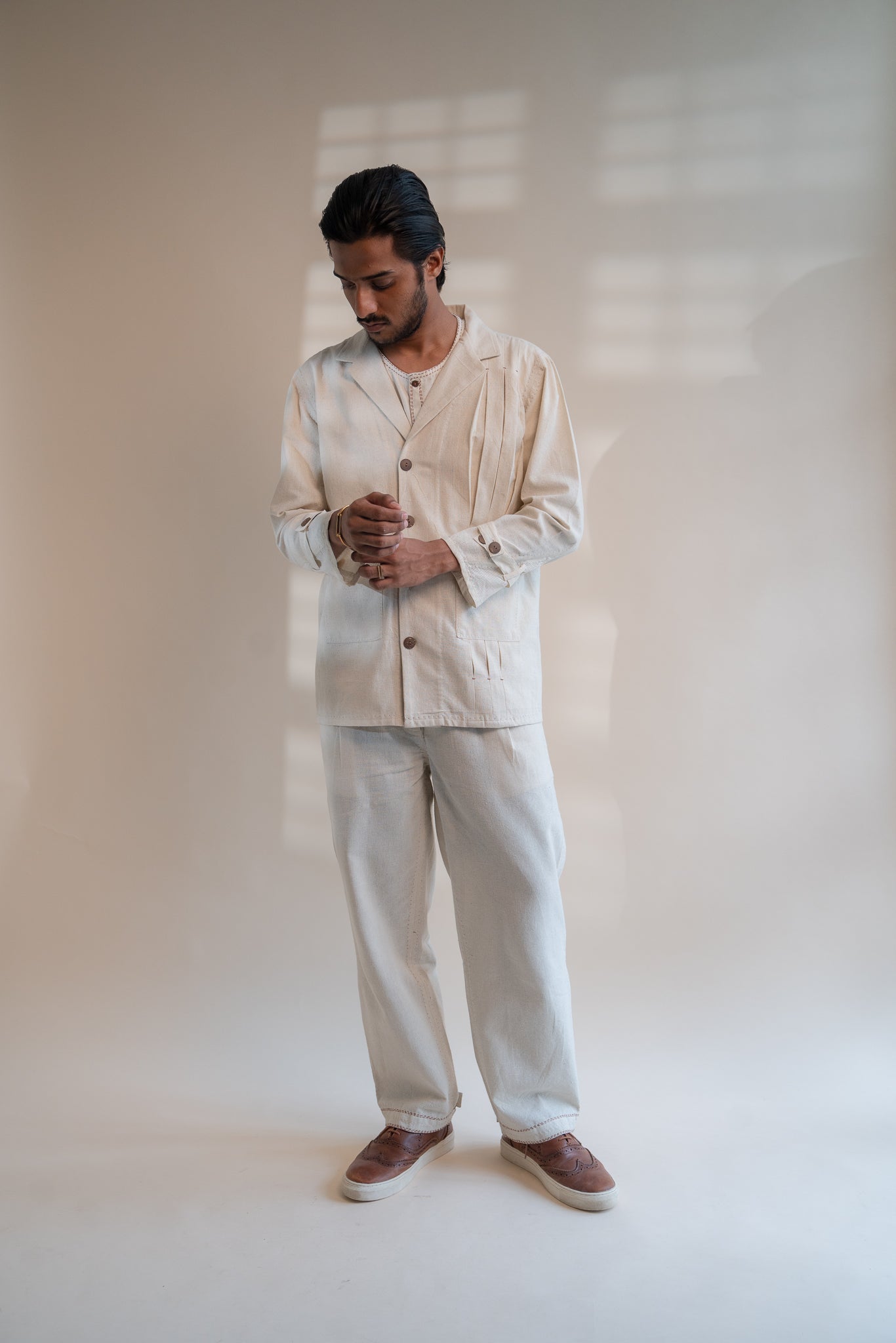 Dawning Unisex Pleated Blazer by Lafaani with Beige, Blazers, Casual Wear, Dawning by Lafaani, Denim, Embroidered, For Him, Hand Woven Cotton, Kora, Mens Overlay, Menswear, Natural, Regular Fit, Unisex at Kamakhyaa for sustainable fashion