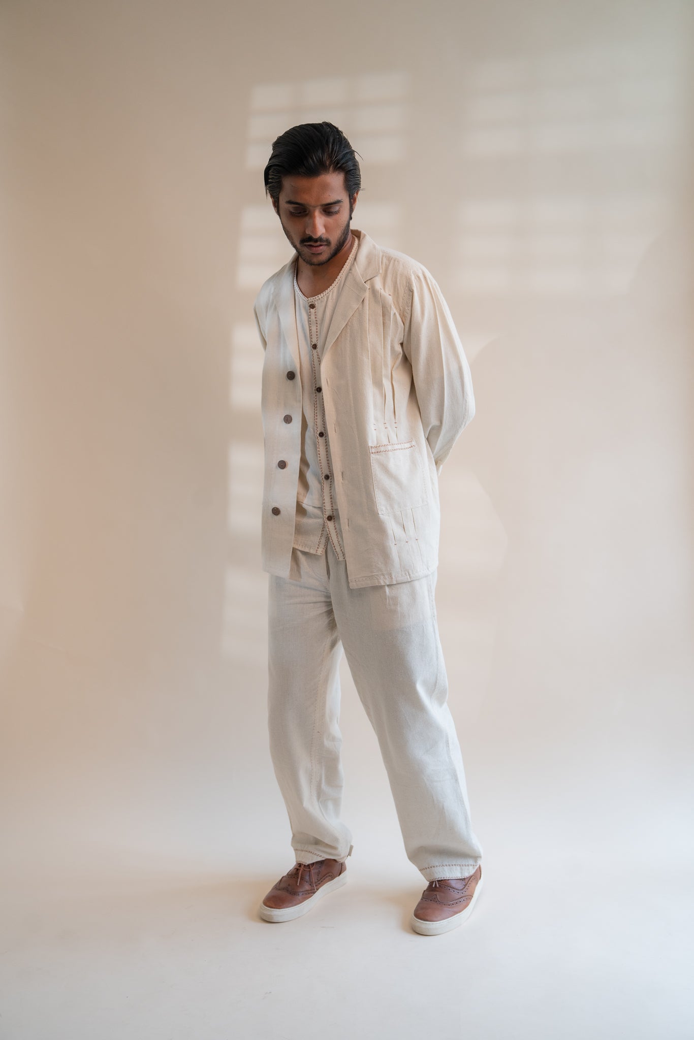 Dawning Unisex Pleated Blazer by Lafaani with Beige, Blazers, Casual Wear, Dawning by Lafaani, Denim, Embroidered, For Him, Hand Woven Cotton, Kora, Mens Overlay, Menswear, Natural, Regular Fit, Unisex at Kamakhyaa for sustainable fashion