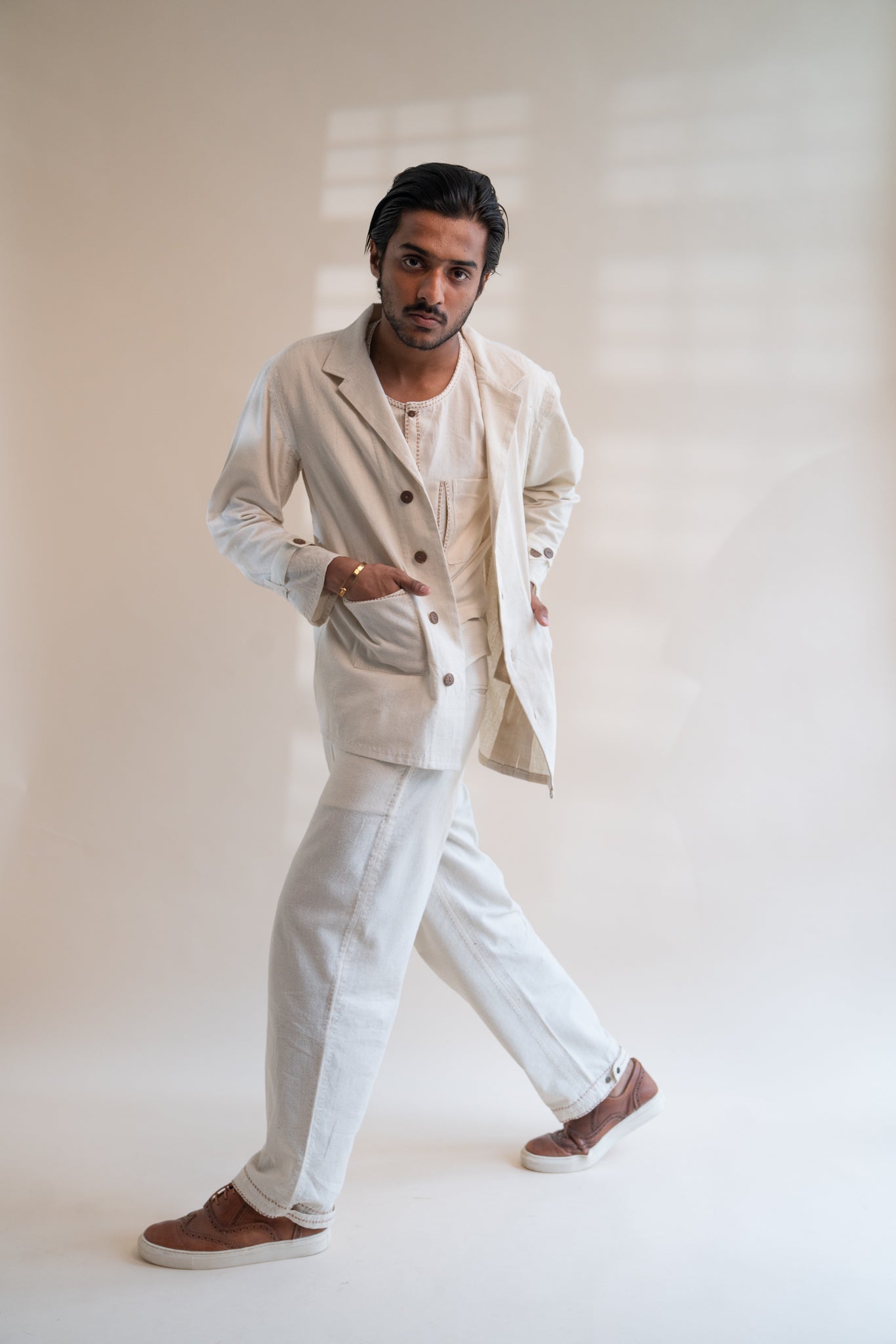 Dawning Unisex Pleated Blazer by Lafaani with Beige, Blazers, Casual Wear, Dawning by Lafaani, Denim, Embroidered, For Him, Hand Woven Cotton, Kora, Mens Overlay, Menswear, Natural, Regular Fit, Unisex at Kamakhyaa for sustainable fashion