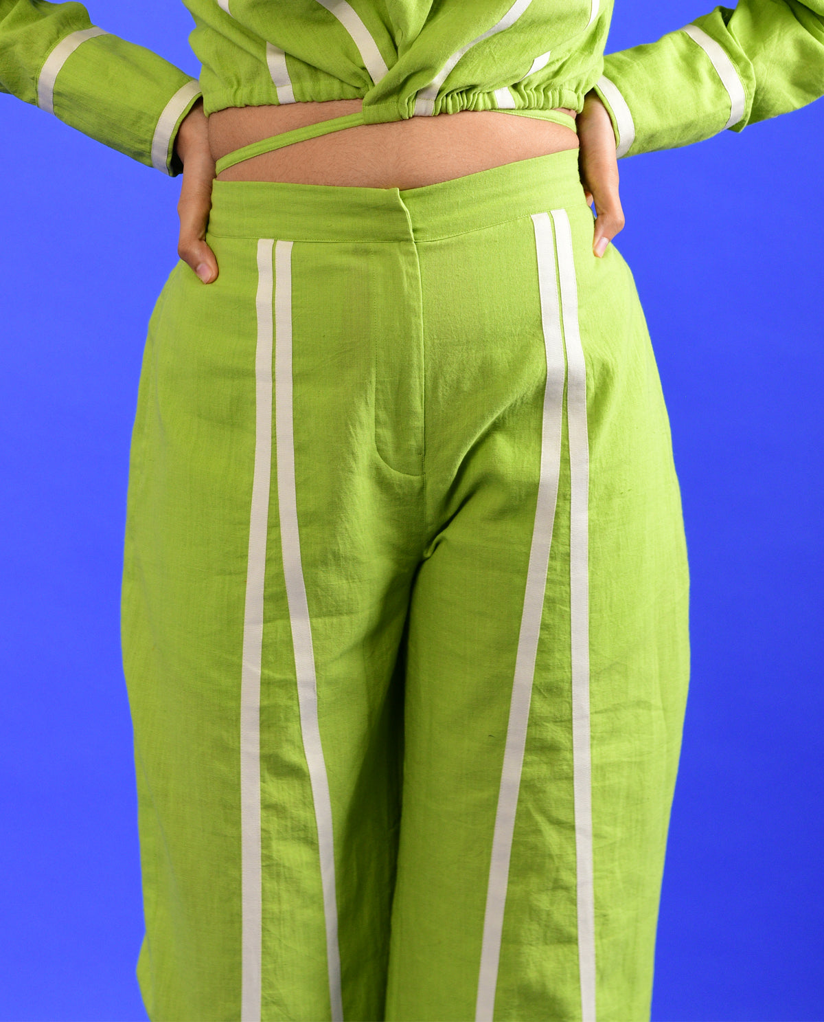Green Solid Pants at Kamakhyaa by Rias Jaipur. This item is 100% Organic Cotton, Casual Wear, Green, Handspun, Handwoven, Hue, Pants, Regular Fit, Stripes, Womenswear