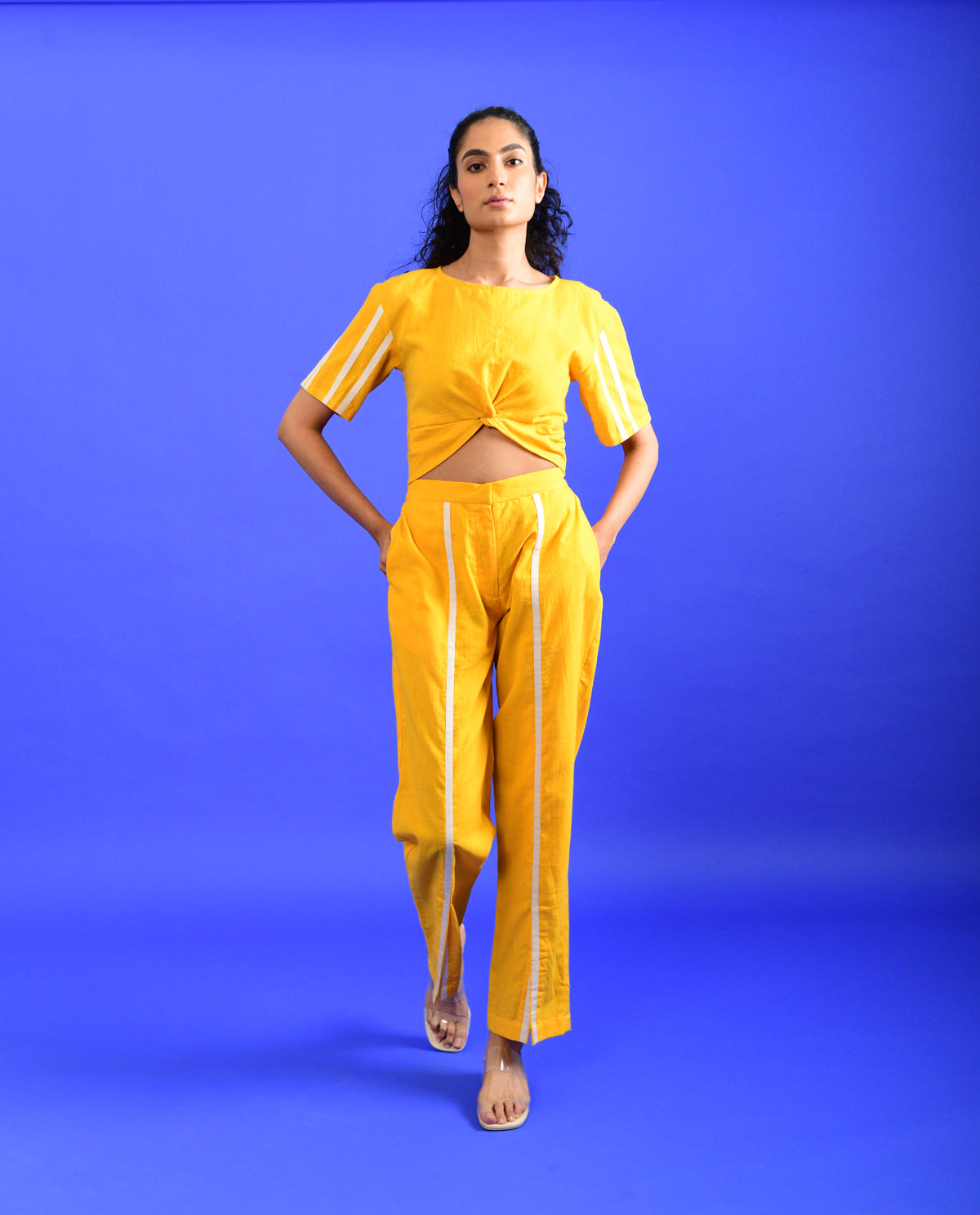 Yellow Solid Co-ord Set at Kamakhyaa by Rias Jaipur. This item is Casual Wear, Co-ord Sets, Handloom Cotton, Handspun, Handwoven, Hue, Regular Fit, Solids, Stripes, Travel, Travel Co-ords, Womenswear, Yellow