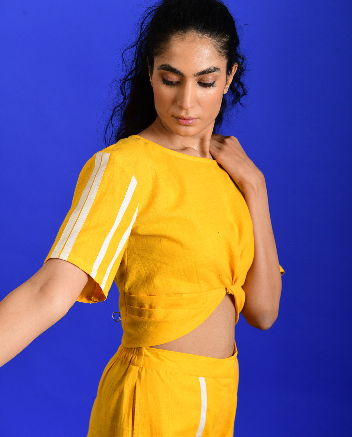 Yellow Knotted Crop Top at Kamakhyaa by Rias Jaipur. This item is Casual Wear, Crop Tops, Handloom Cotton, Handspun, Handwoven, Hue, Regular Fit, Solids, Stripes, Womenswear, Yellow