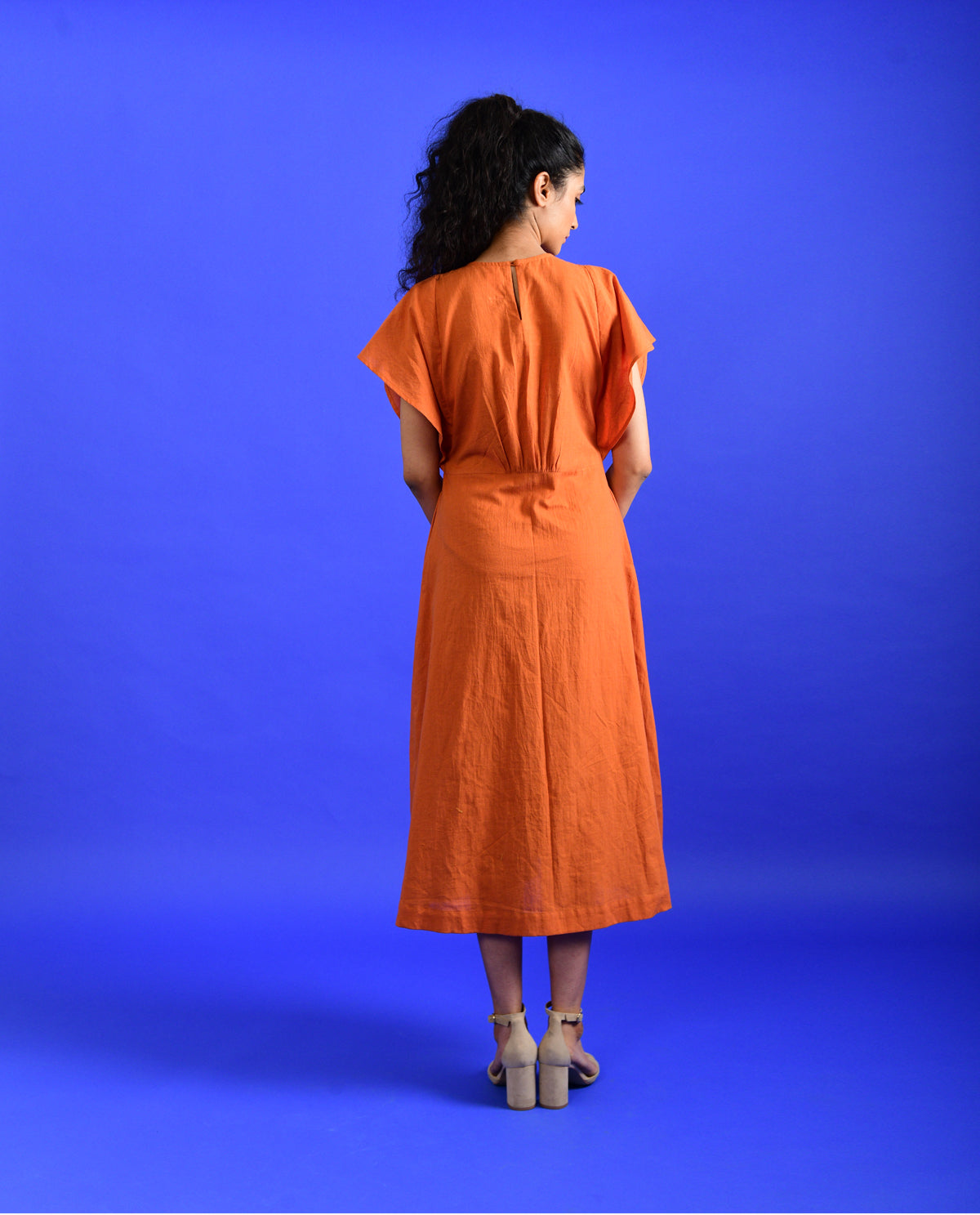 Orange Midi Dress at Kamakhyaa by Rias Jaipur. This item is Best Selling, Casual Wear, Handloom Cotton, Handspun, Handwoven, Hue, Midi Dresses, Orange, Regular Fit, Stripes, Womenswear