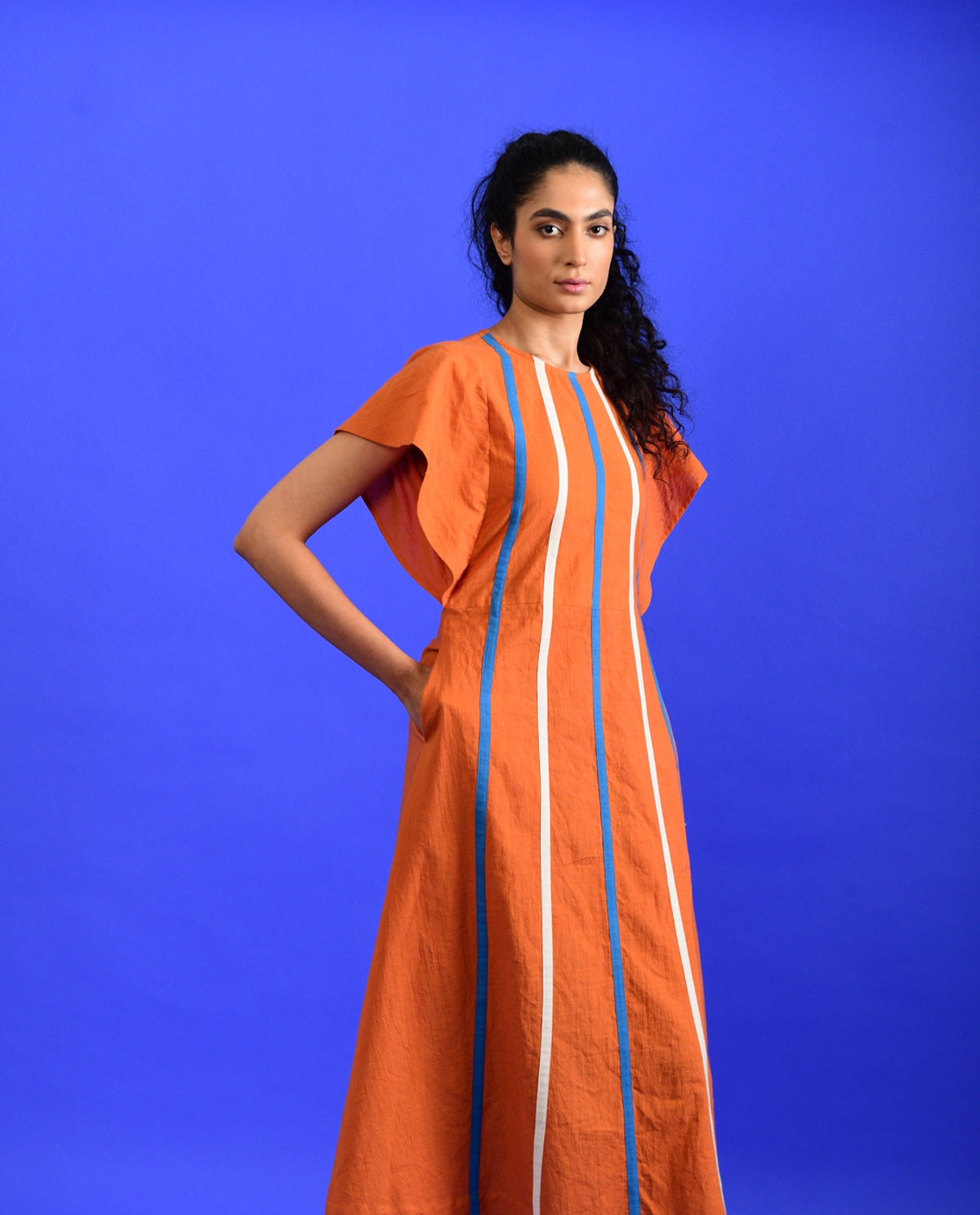 Orange Midi Dress by Rias Jaipur with Best Selling, Casual Wear, Handloom Cotton, Handspun, Handwoven, Hue, Midi Dresses, Orange, Regular Fit, Rias Hue by Rias Jaipur, Stripes, Womenswear at Kamakhyaa for sustainable fashion