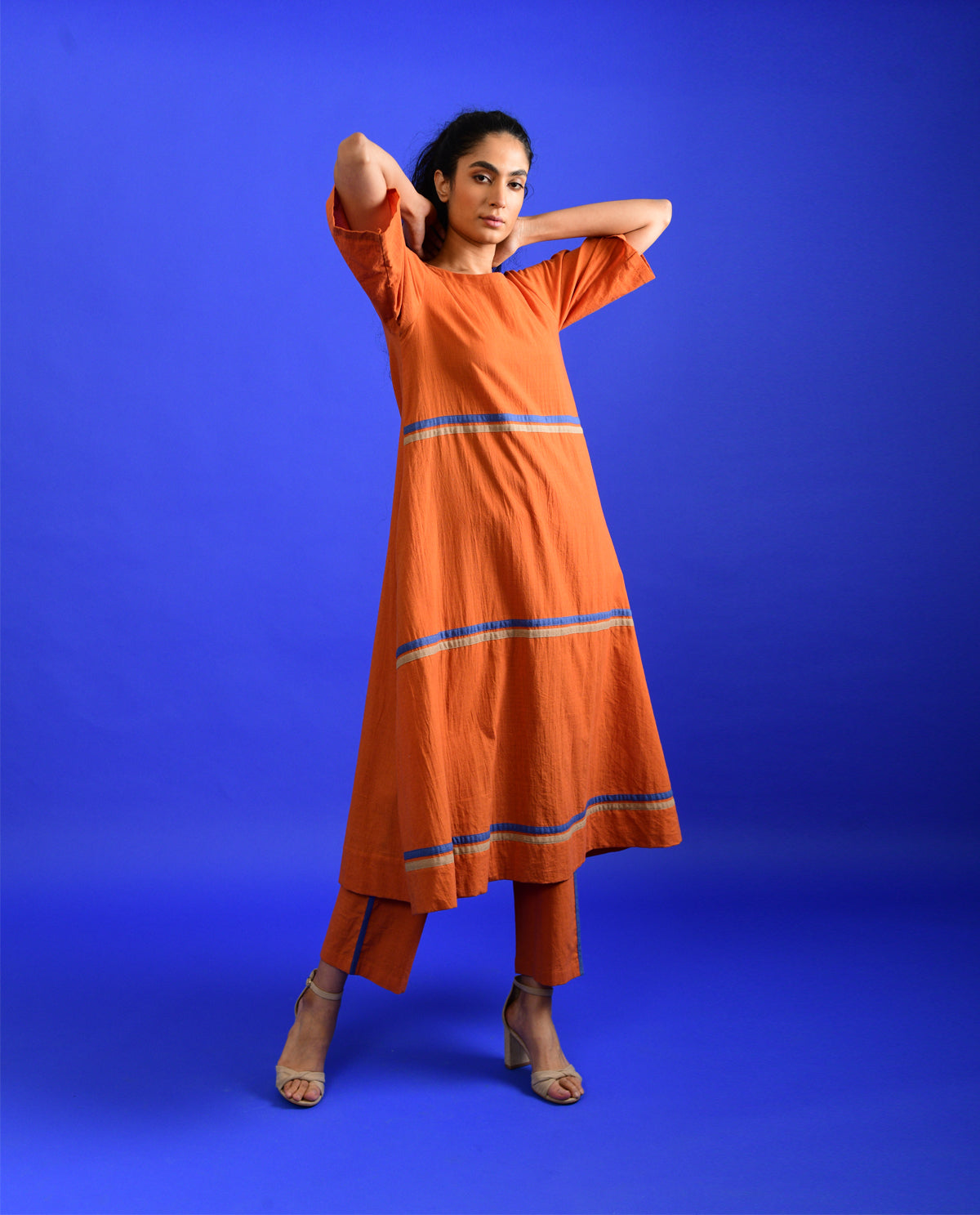Orange Cotton Co-ord Set at Kamakhyaa by Rias Jaipur. This item is Casual Wear, Co-ord Sets, Handloom Cotton, Handspun, Handwoven, Hue, Orange, Regular Fit, Stripes, Travel, Travel Co-ords, Womenswear