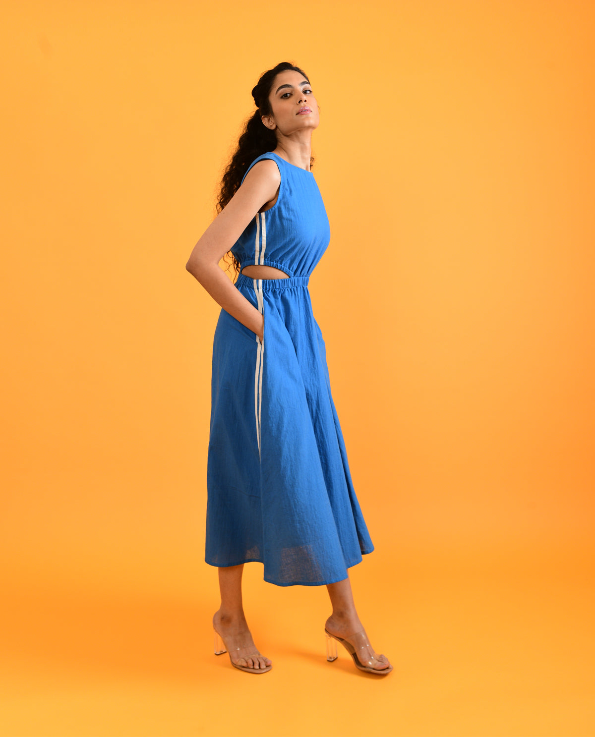 Blue Midi Dress at Kamakhyaa by Rias Jaipur. This item is Blue, Casual Wear, Cut Out Dresses, Handloom Cotton, Handspun, Handwoven, Hue, Midi Dresses, Sleeveless Dresses, Slim Fit, Solids, Stripes, Womenswear