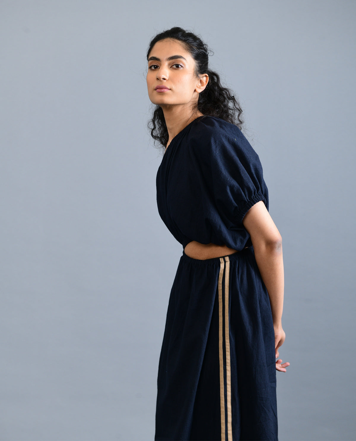 Black Solid Midi Dress by Rias Jaipur with Black, Casual Wear, Handloom Cotton, Handspun, Handwoven, Hue, Midi Dresses, One Shoulder Dresses, Relaxed Fit, Rias Hue by Rias Jaipur, Solids, Stripes, Womenswear at Kamakhyaa for sustainable fashion