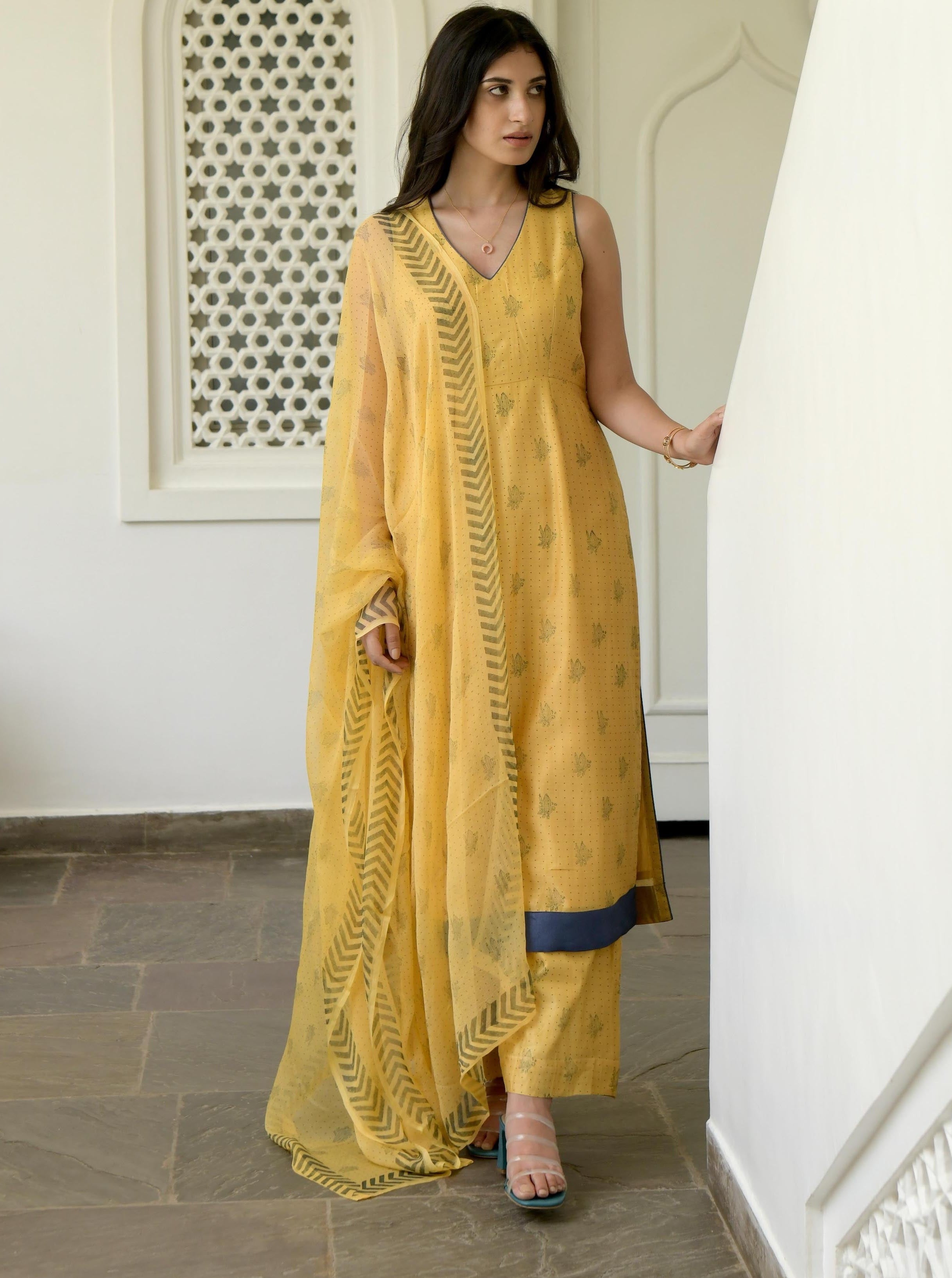 Yellow Sleeveless Chanderi Silk Kurta Set With Dupatta by Taro with Best Selling, Evening Wear, Gulzar by Taro, Handwoven Chanderi silk, Indian Wear, July Sale, July Sale 2023, Kurta Pant Sets, Kurta Set With Dupatta, Natural, Prints, Regular Fit, Womenswear, Yellow at Kamakhyaa for sustainable fashion