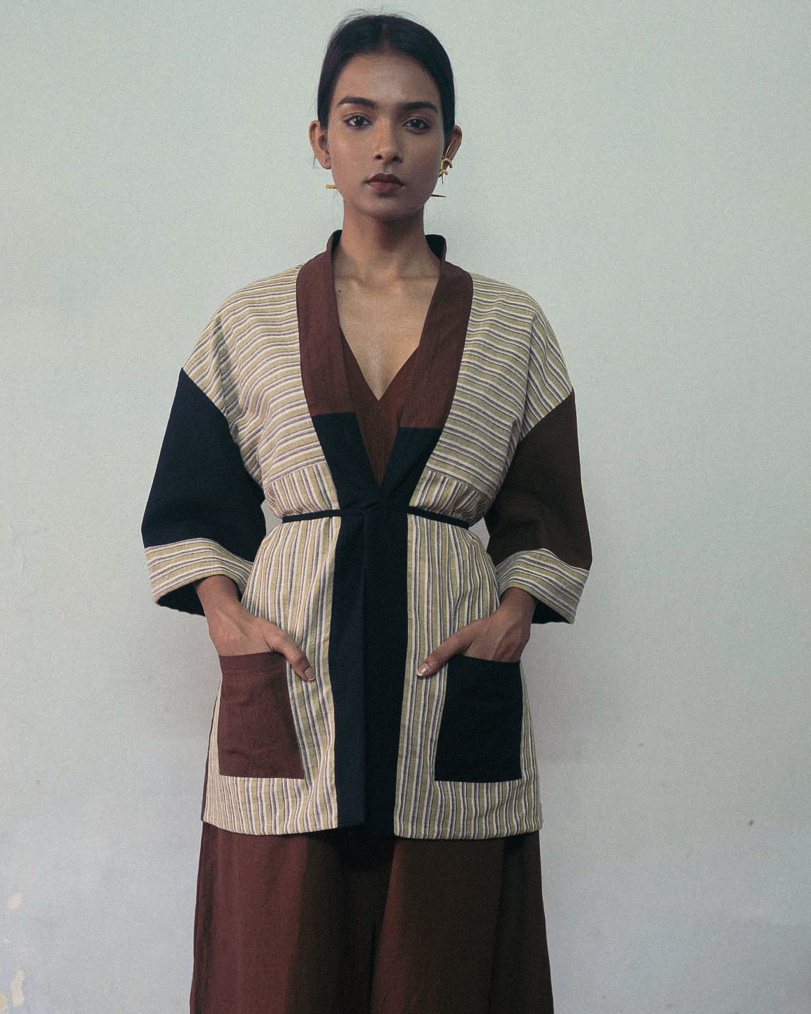 Black And Brown Reversible Jacket by Deeta Clothing with Black, Brown, Casual Wear, Handwoven Cotton, Jackets, Natural with azo dyes, Relaxed Fit, Reversible, Shibui AW22, Stripes, Womenswear at Kamakhyaa for sustainable fashion