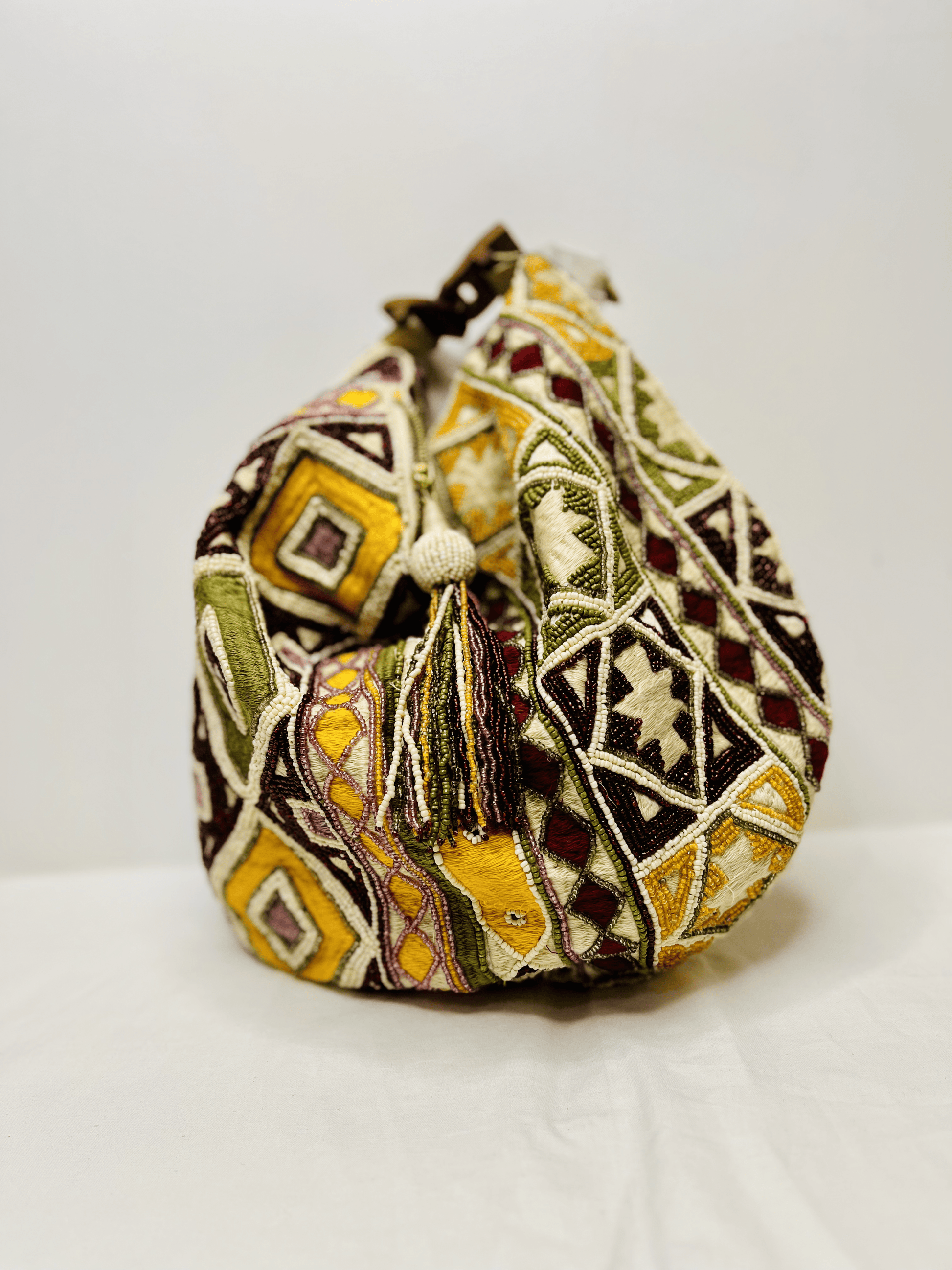 Yellow Multicolor Potli Bag by Discarded Fresh Bags with Beads, Casual Wear, Made from Natural Materials, Mirror Work, Multicolor, Potli Bags, Satin, White, Women Led Designer at Kamakhyaa for sustainable fashion