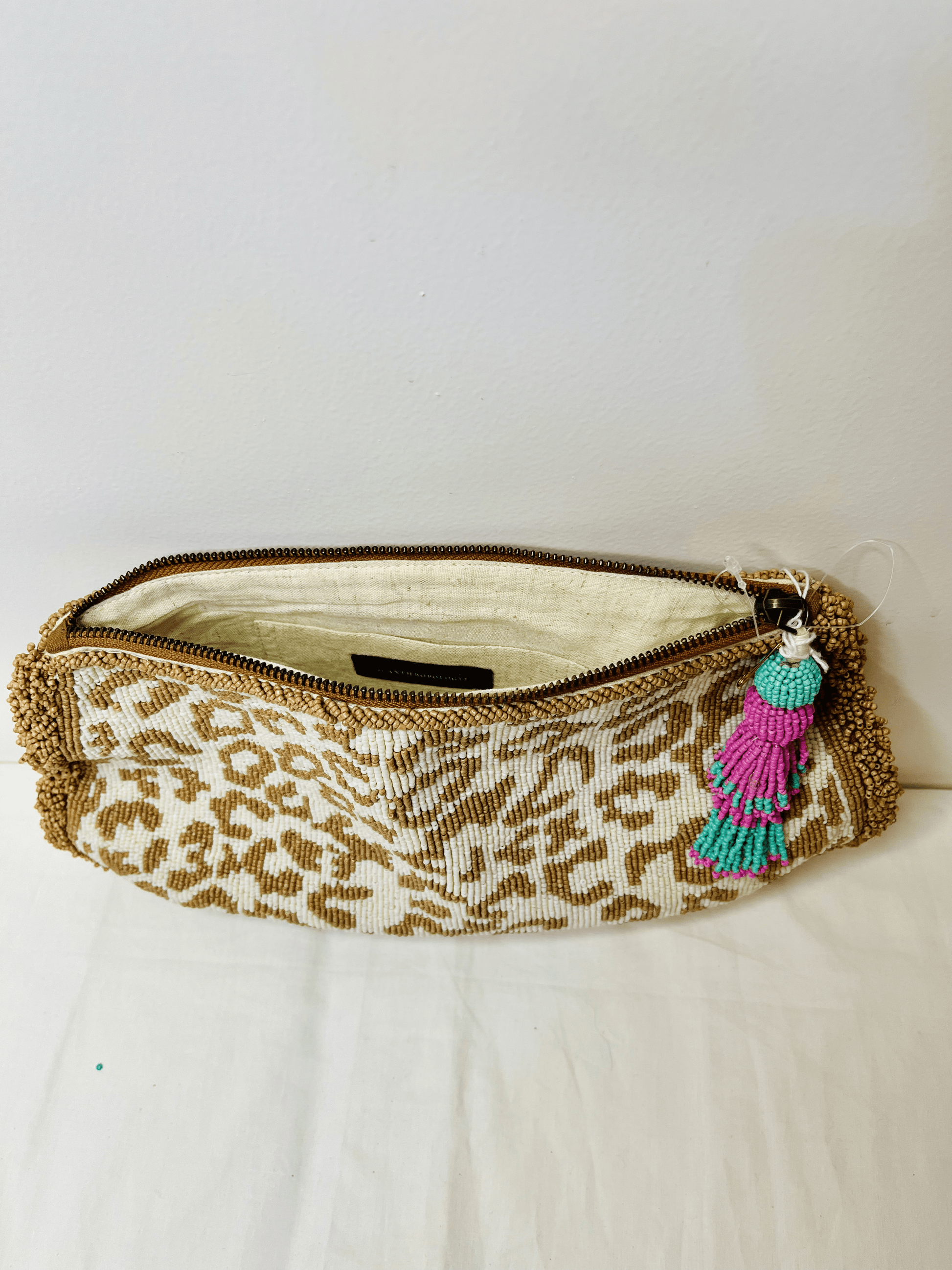 Animal Print Pouch by Discarded Fresh Bags with Beads, Casual Wear, Cotton, Made from Natural Materials, Mirror Work, Multicolor, Pouches, White, Women Led Designer at Kamakhyaa for sustainable fashion