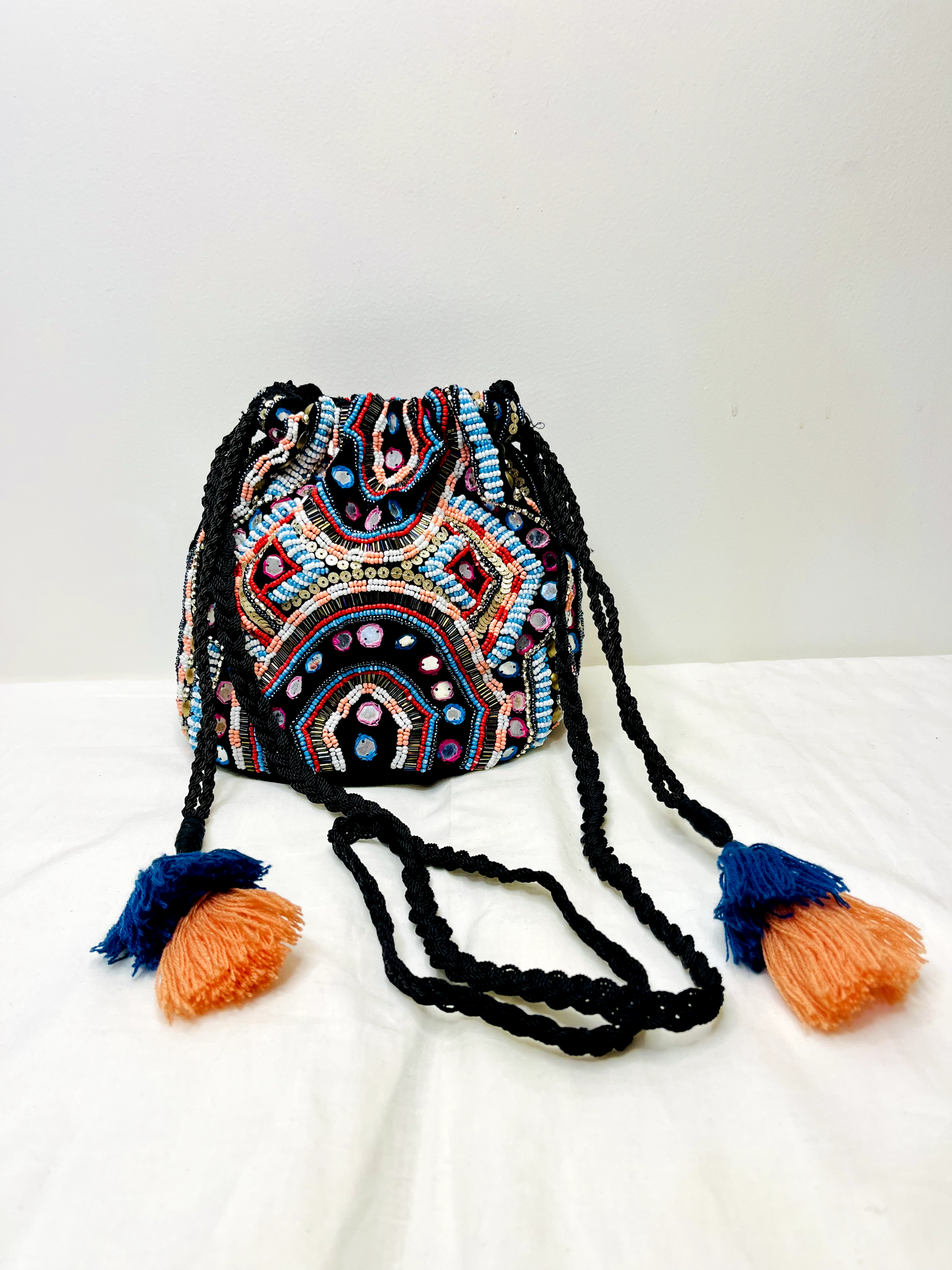 Black Mirror Potli Bag at Kamakhyaa by Pre Loved. This item is Bags, Casual Wear, For Mother, Mirror Work, Multicolor, Natural, Potli Bags
