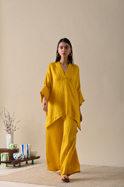 Yellow Co-ord Set at Kamakhyaa by Kanelle. This item is Best Selling, Casual Wear, Co-ord Sets, For Mother, For Mother W, July Sale, Life in Colours, Linen Satin, Lounge Wear Co-ords, Natural with azo dyes, Relaxed Fit, Solids, Vacation Co-ords, Womenswear, Yellow