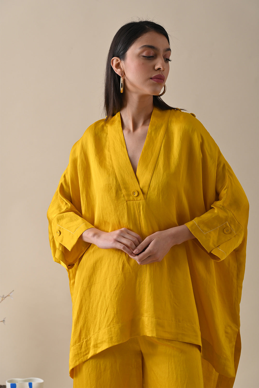 Yellow Tunic Top at Kamakhyaa by Kanelle. This item is Best Selling, Casual Wear, For Mother, For Mother W, July Sale, kaftan Tops, Life in Colours, Linen Satin, Relaxed Fit, Solids, Womenswear, Yellow