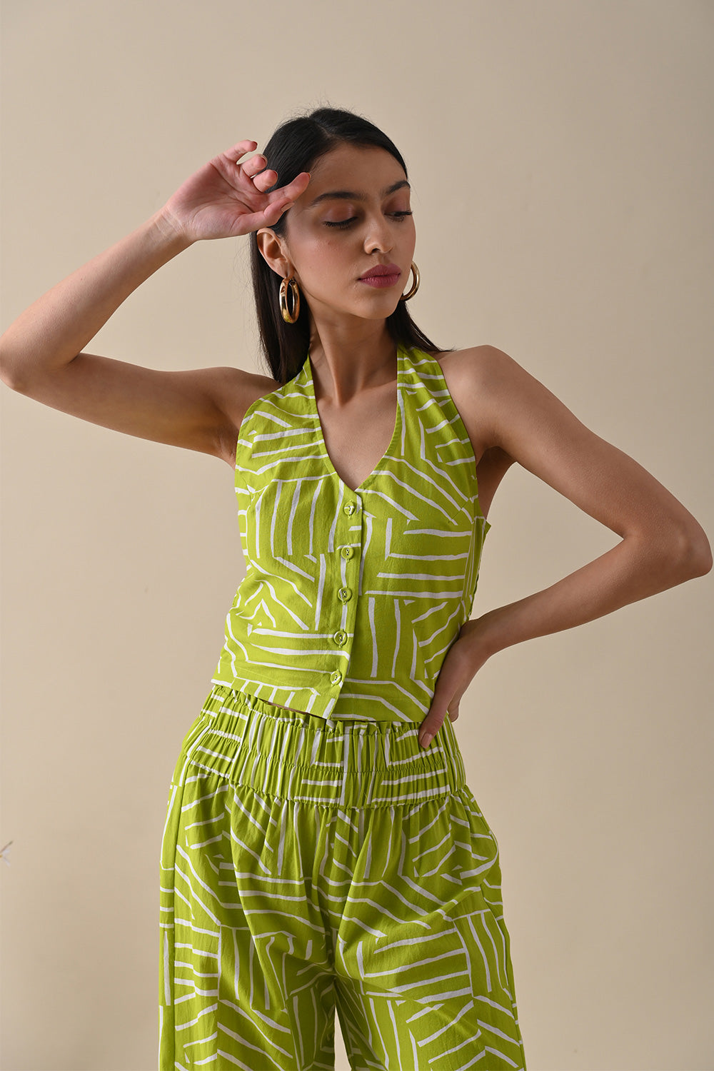 Olive Halter Neck Top at Kamakhyaa by Kanelle. This item is 100% Cotton, Best Selling, Casual Wear, Halter Neck Tops, July Sale, Life in Colours, Natural, Natural with azo dyes, Olive Green, Printed Selfsame, Prints, Regular Fit, Womenswear